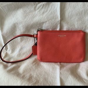 Small Coach coral wristlet